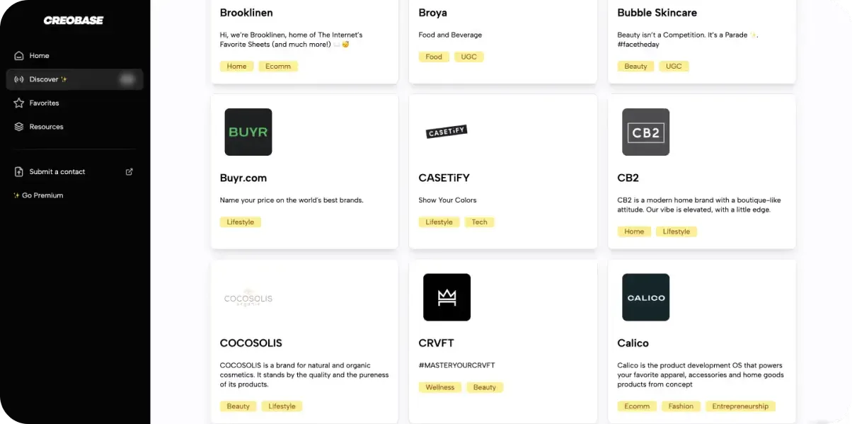 The Creobase Discover app built on Noloco, a directory of brand cards with category tags